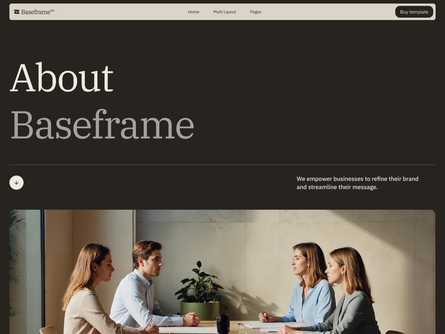 Two men and two women sitting at a wooden table in a modern office having a discussion with a potted plant in the background.