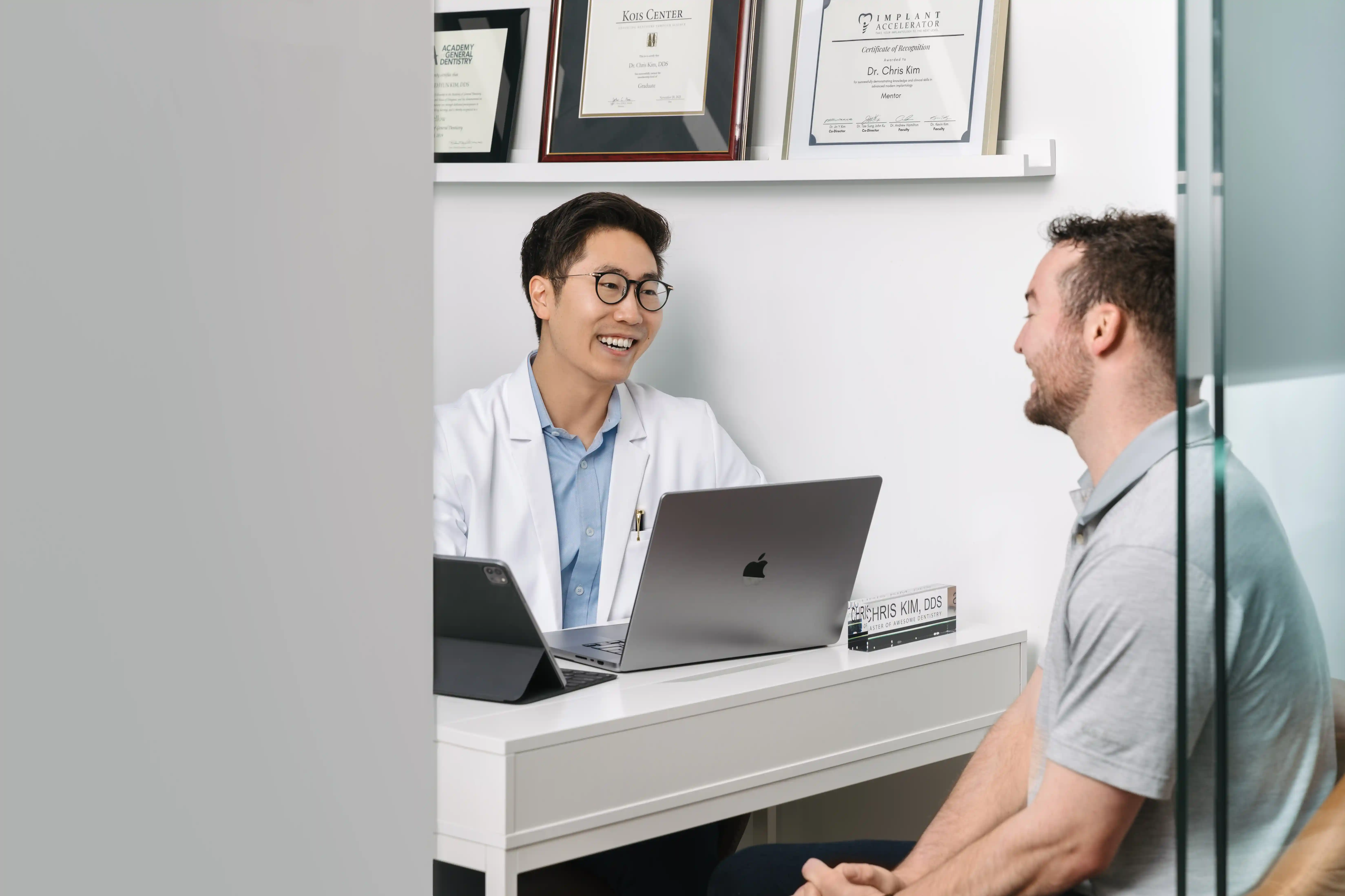 Dr. Chris Kim with a patient at Livewell Dental
