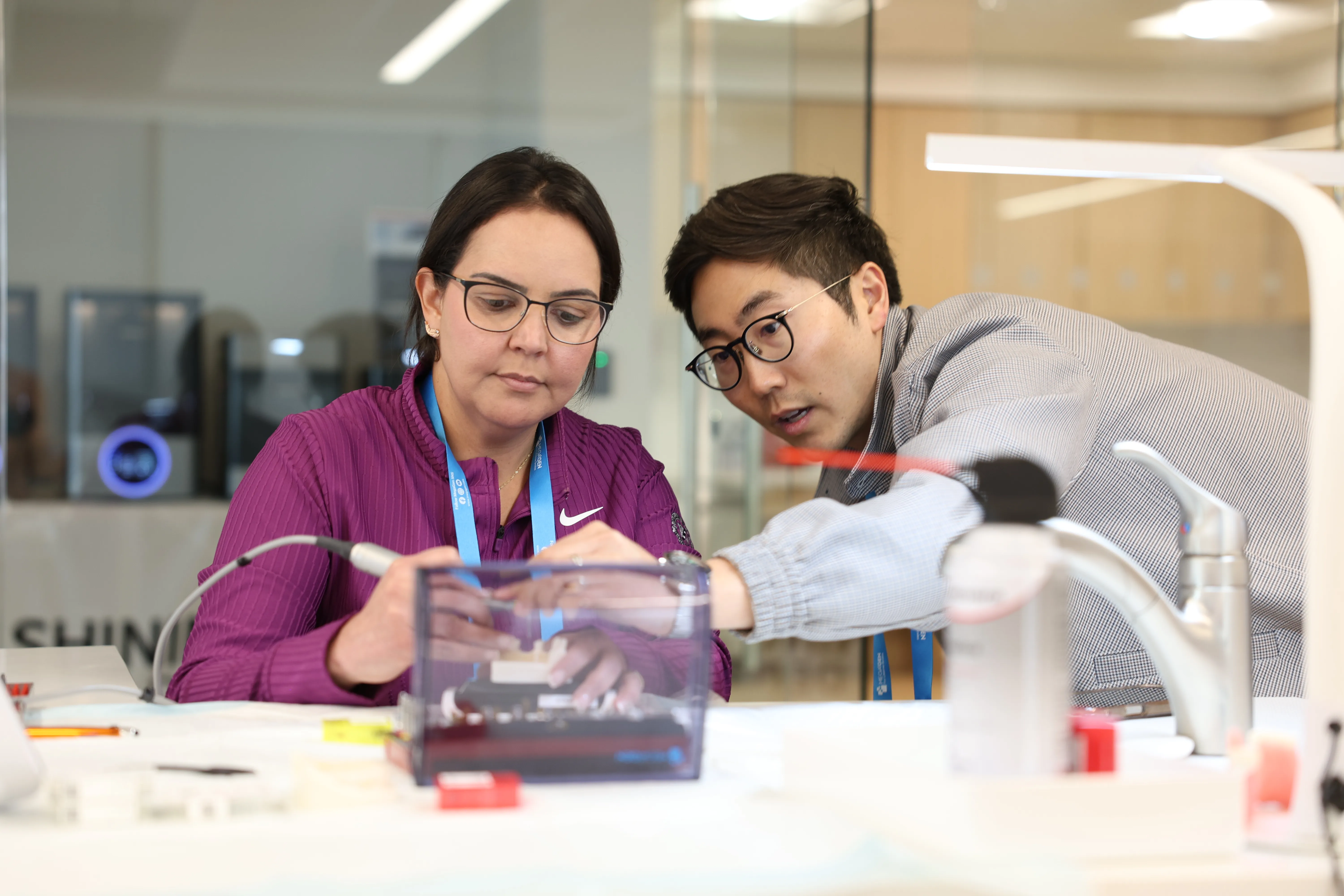 Dr. Chris Kim teaching a hands-on dental course at Implant Accelerator
