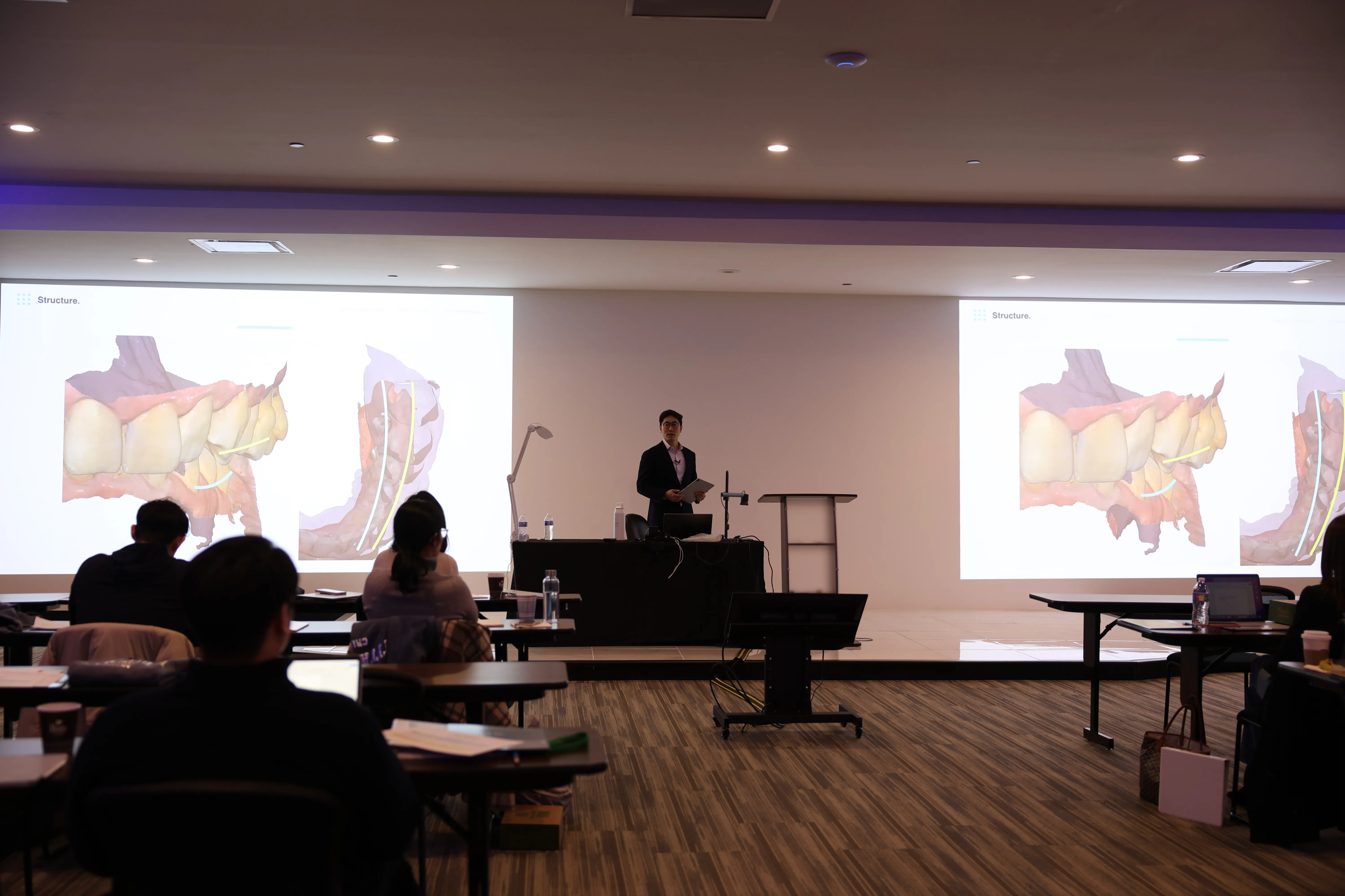 Dental professionals at an advanced training session with Dr. Chris Kim