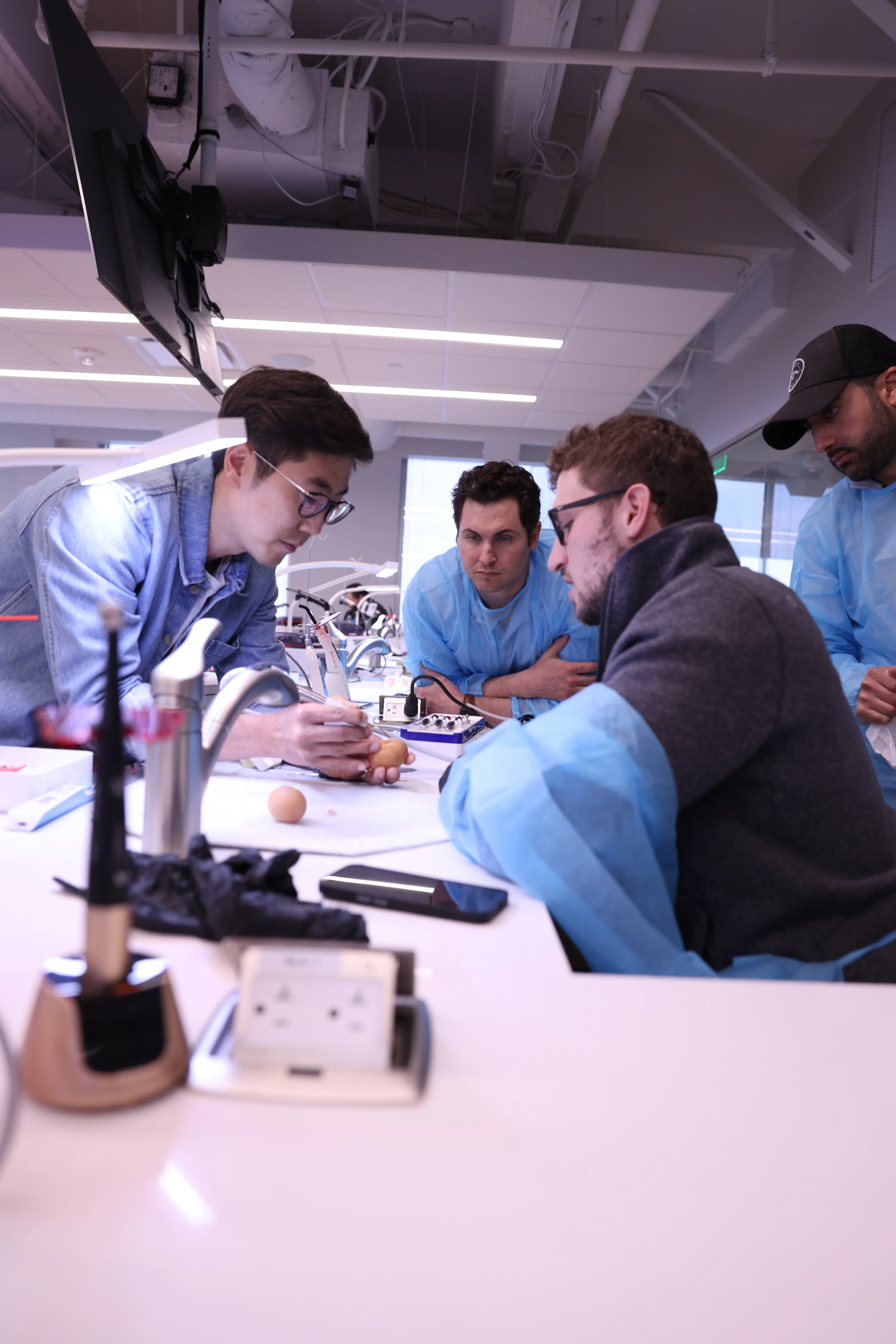 Dr. Chris Kim with a group of dentists at an advanced training course