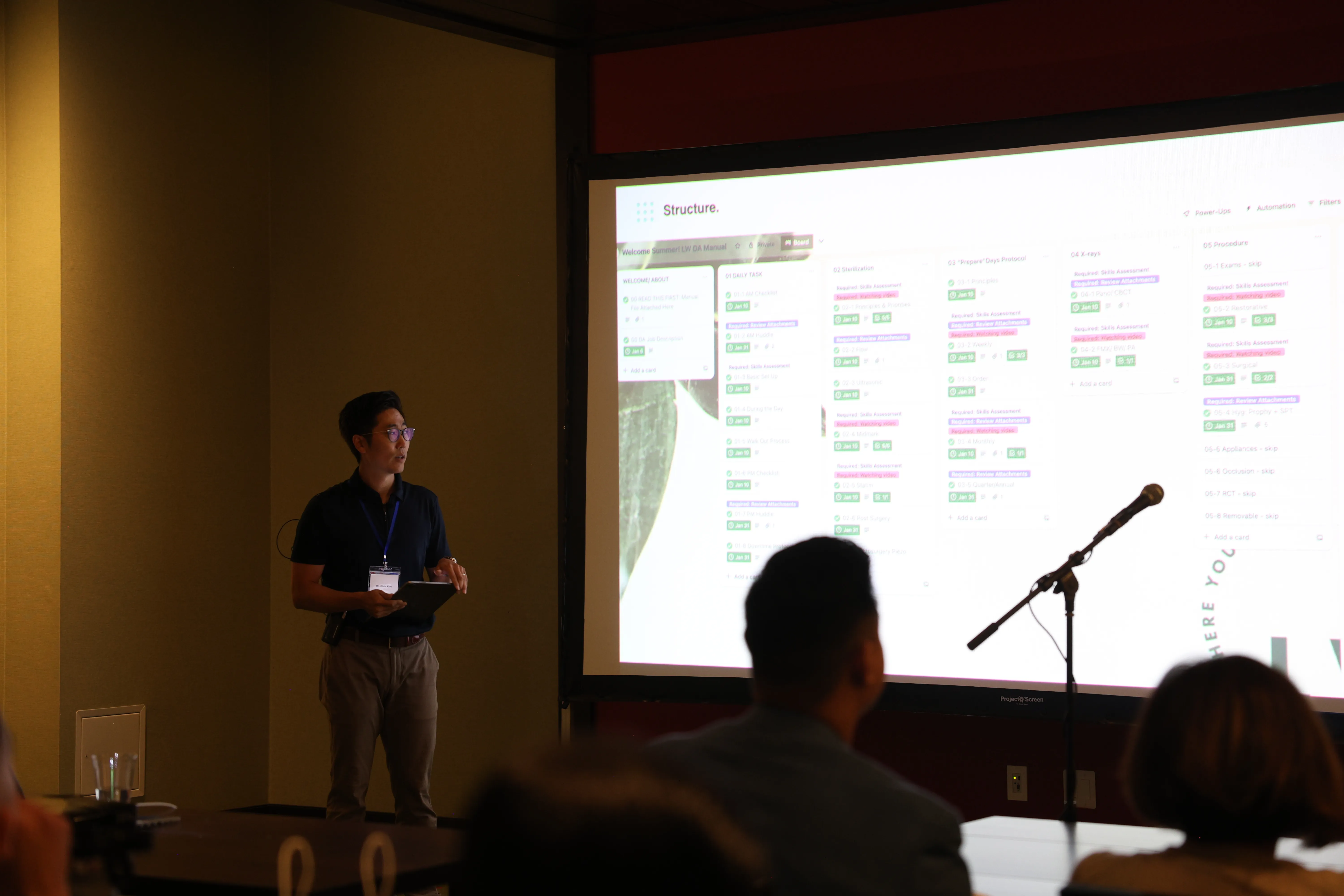 Dr. Chris Kim demonstrating complex technique at a dental education event