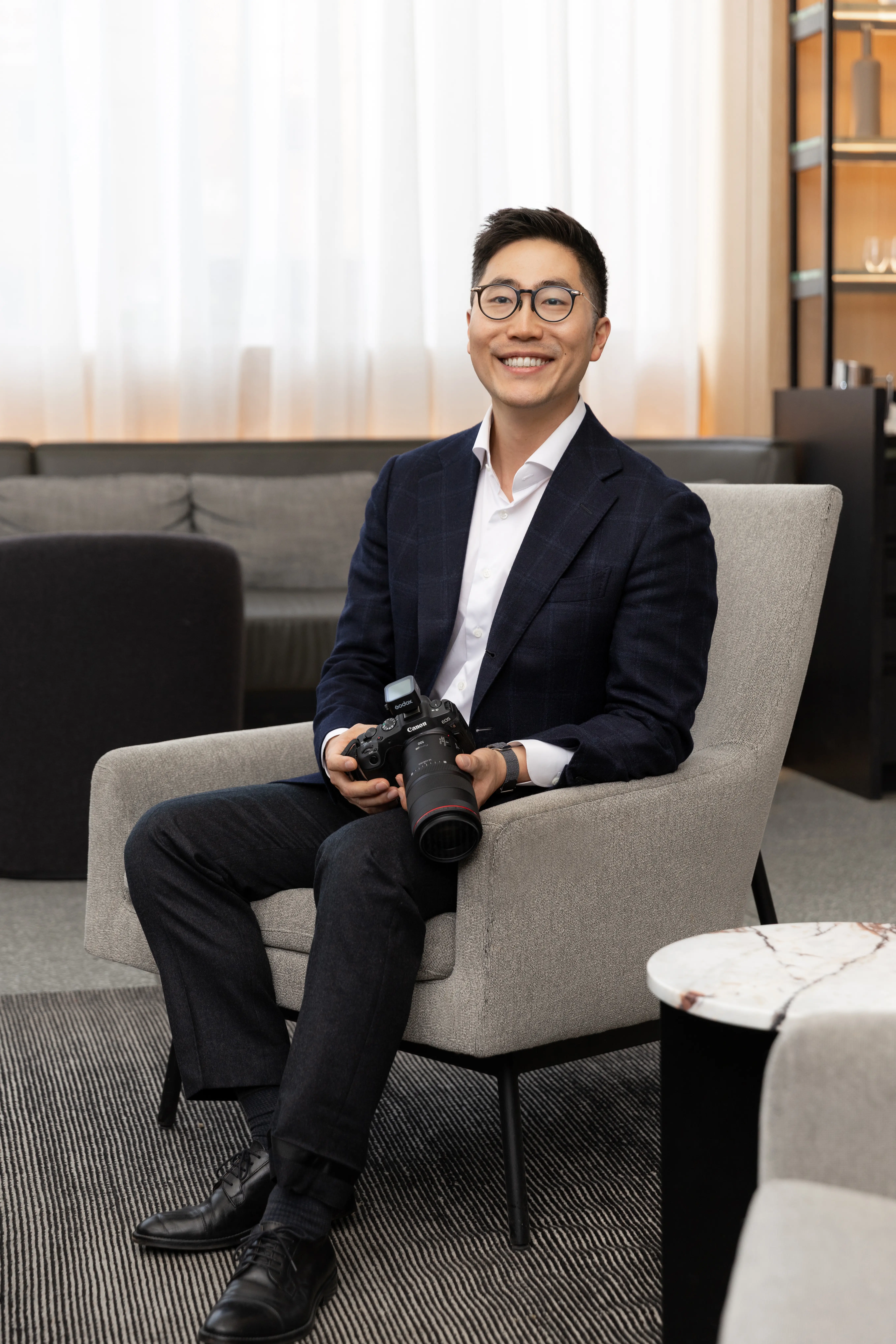 Dr. Chris Kim reviewing implant bridge treatment planning at Livewell Dental
