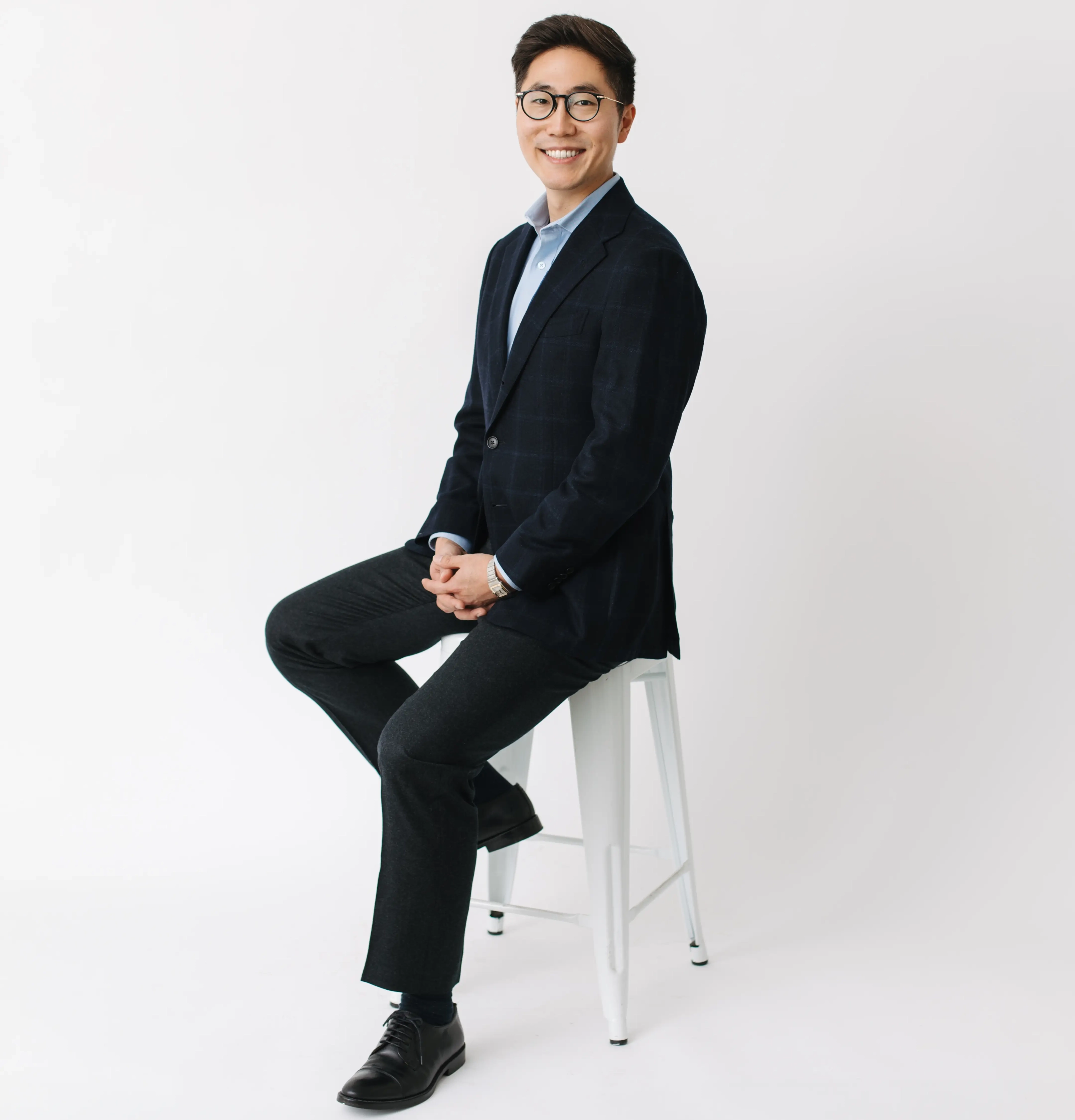 image shows Dr. Kim in dark suit, professional portrait