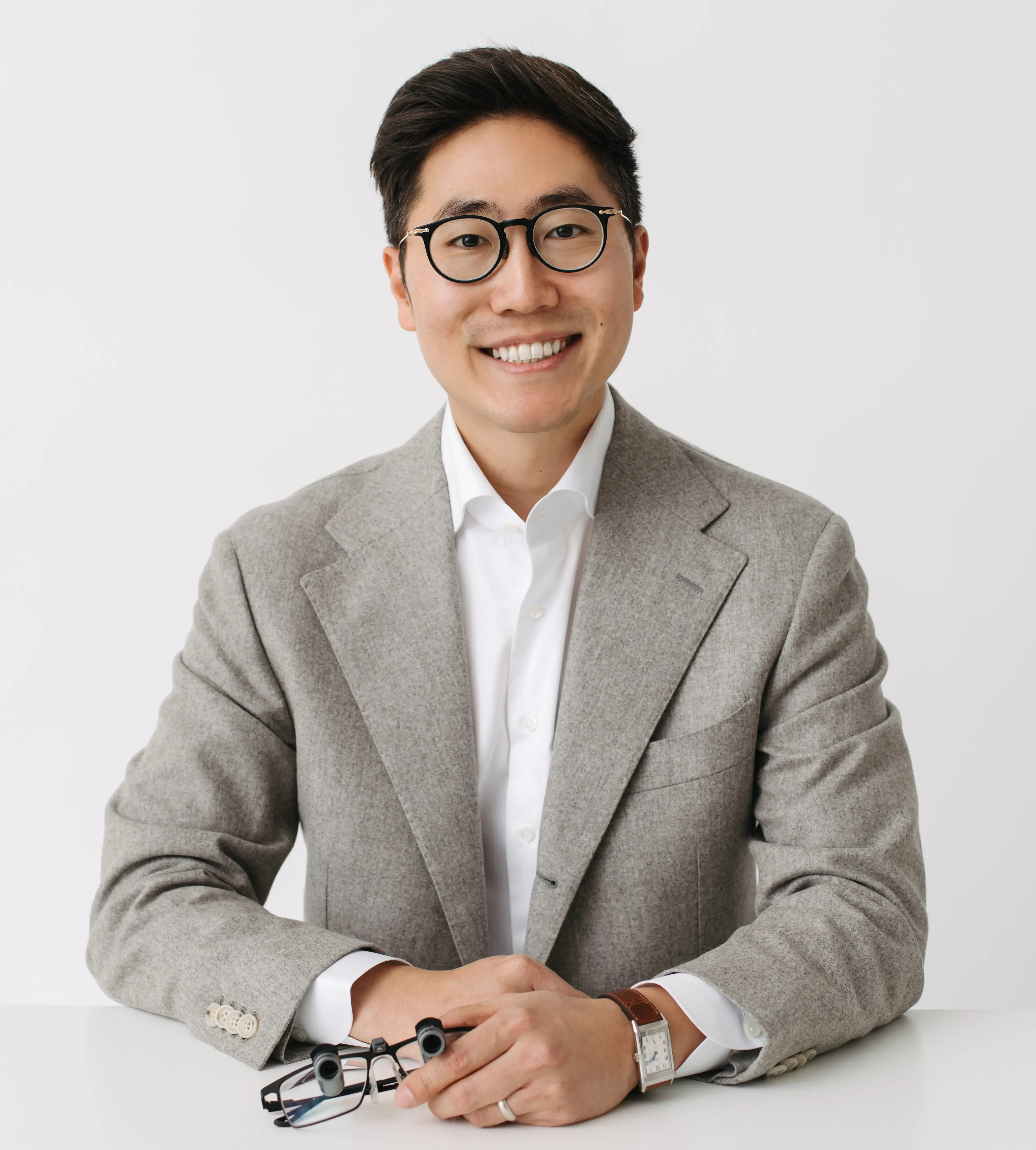 Dr. Chris Kim planning orthodontic treatment at Livewell Dental