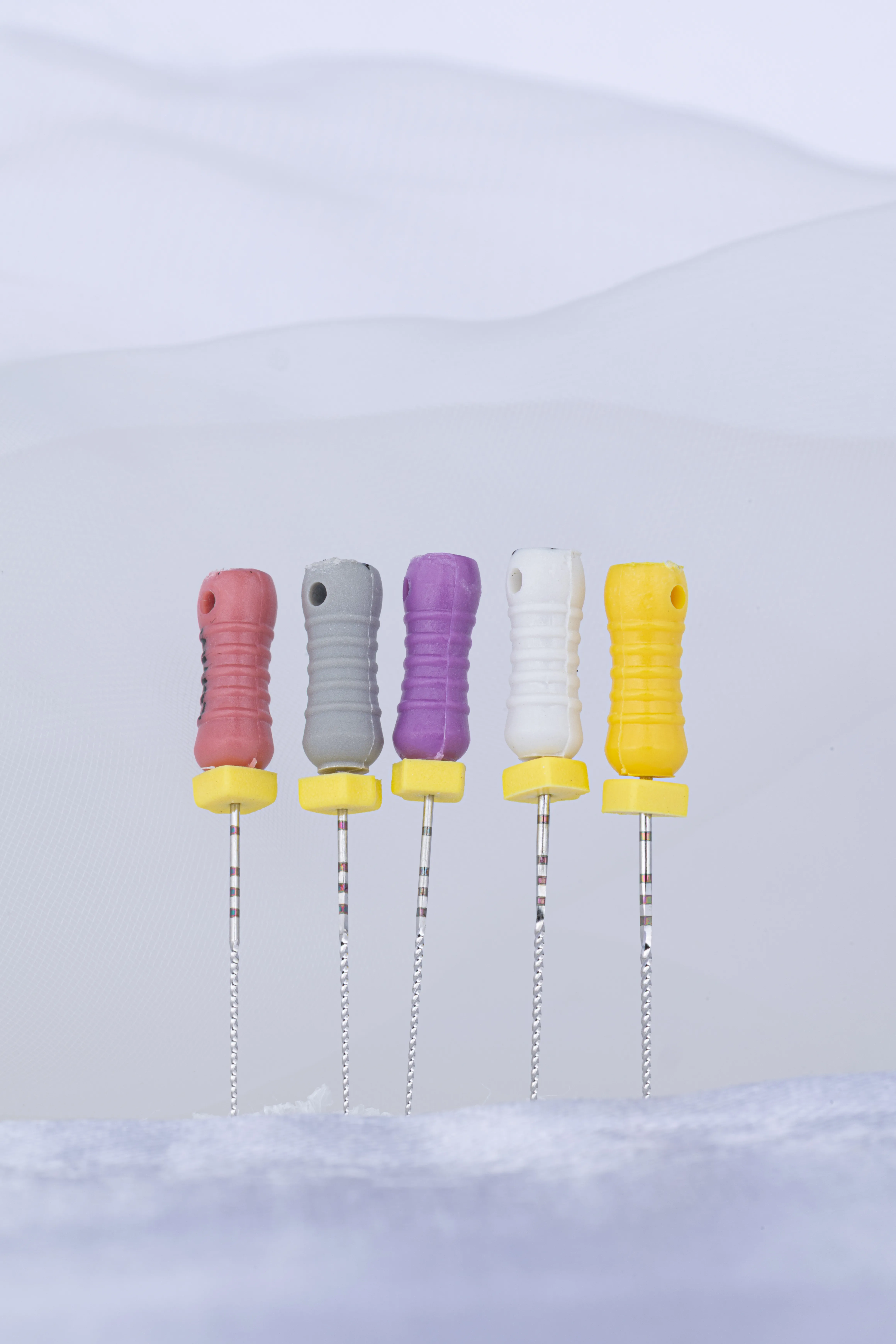 Color-coded endodontic files used during root canal treatment