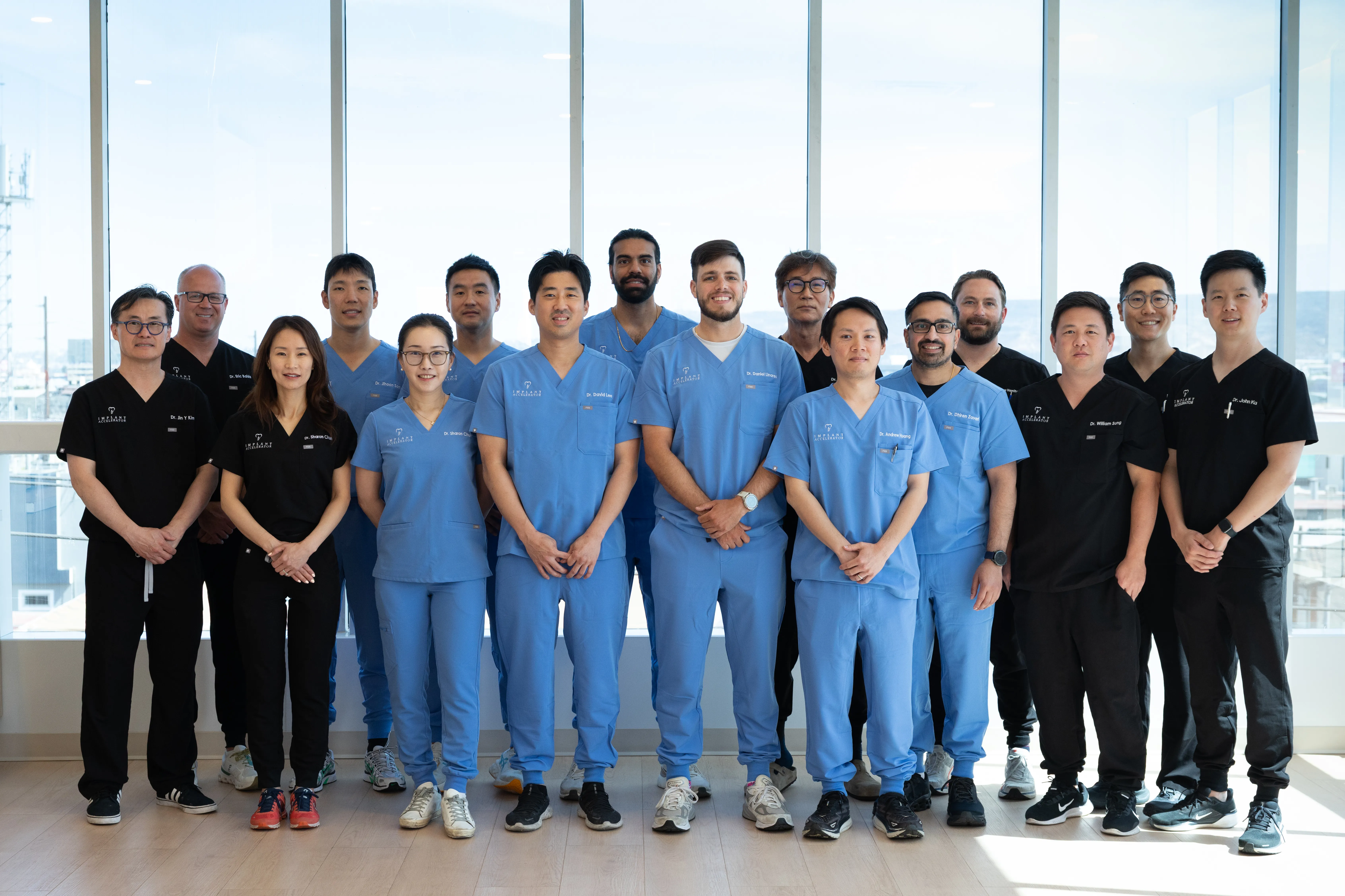 Group of dental professionals at an advanced implant training session led by Dr. Chris Kim