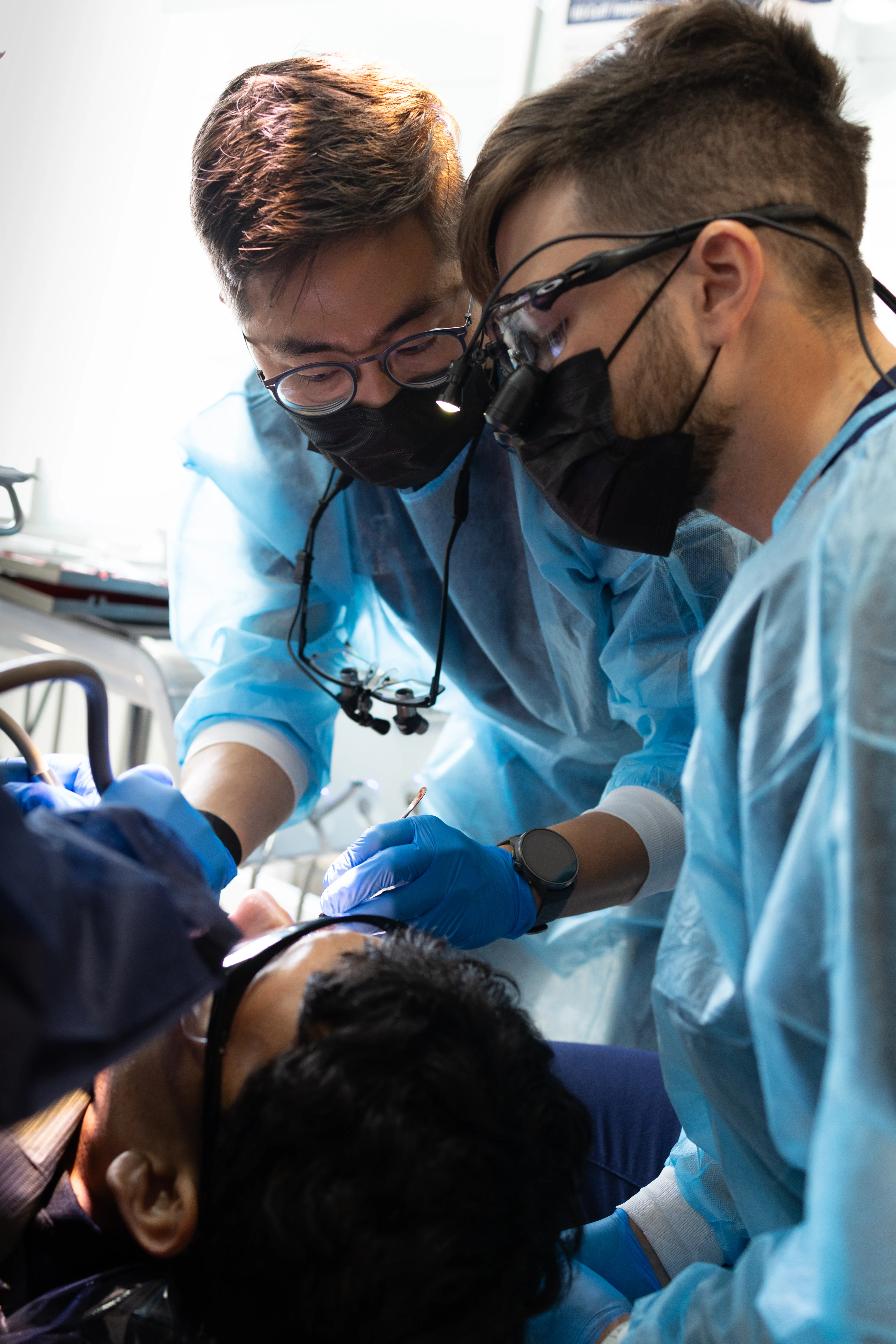 Dr. Chris Kim demonstrating technique at a dental education event