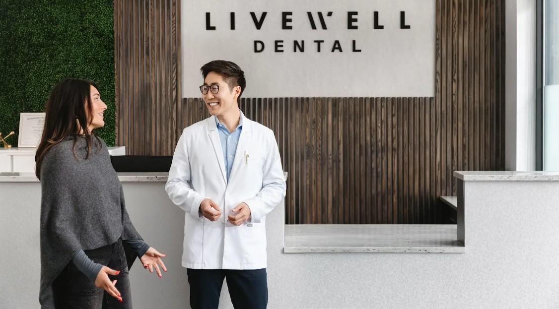 Livewell Dental team standing inside the Fairfax Station office