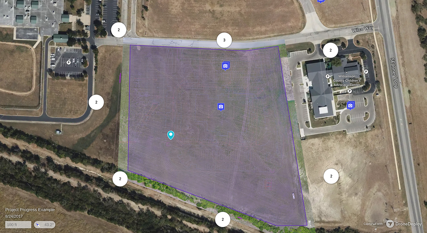 Aerial map view showing a large plot of land outlined in purple adjacent to Williamson County Children’s Advocacy Center, bordered by Wilco Way and SE Inner Loop roads.