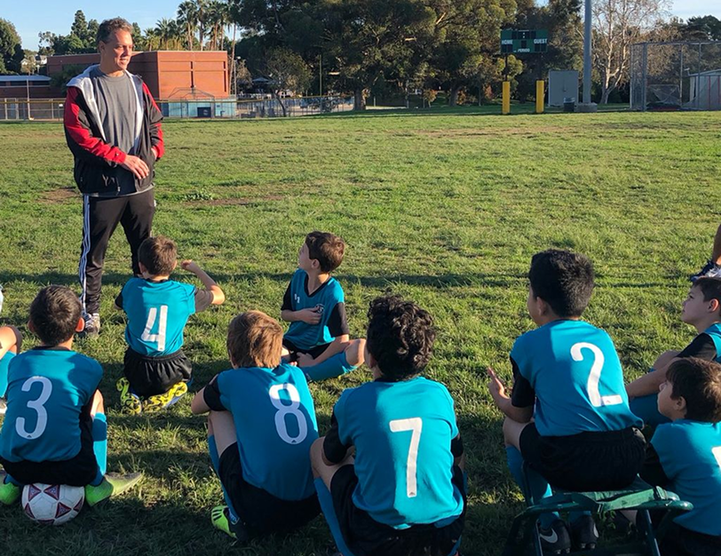 Adam coaching one of his many AYSO teams