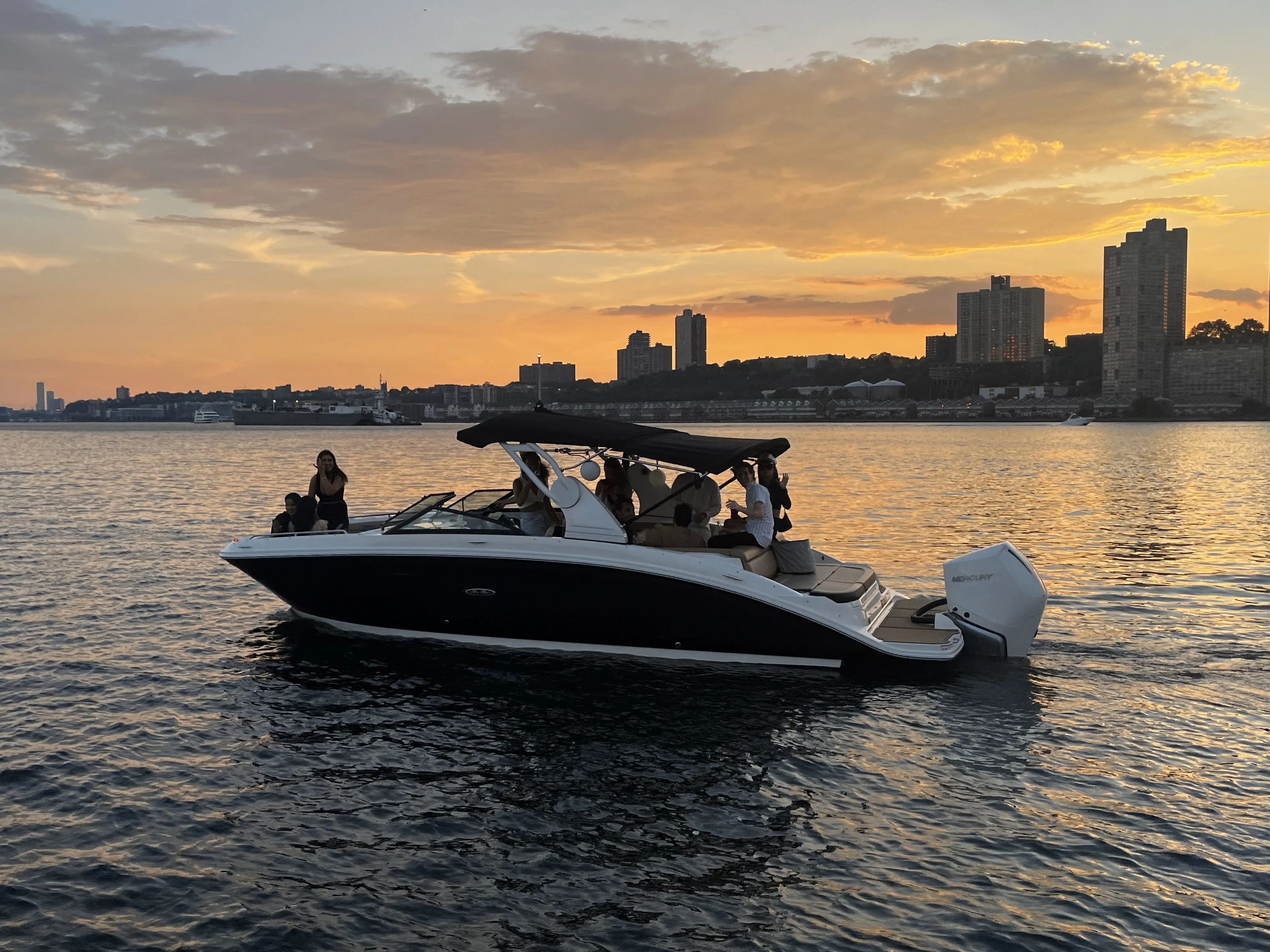 Private sunset boat rental on the Manhattan Mermaid right here in NYC