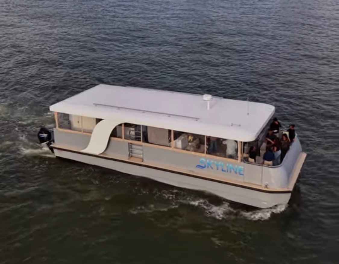 Aerial view of Skyline yacht on the Hudson River with the Manhattan skyline