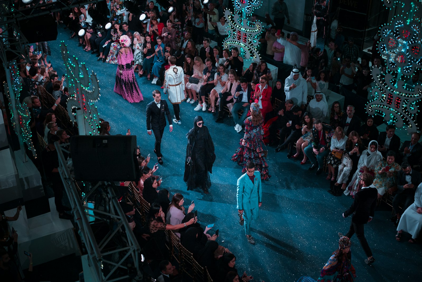 Models on a fashion show runway — the high-fashion energy of Balenciaga's Mumbai SS2026 debut