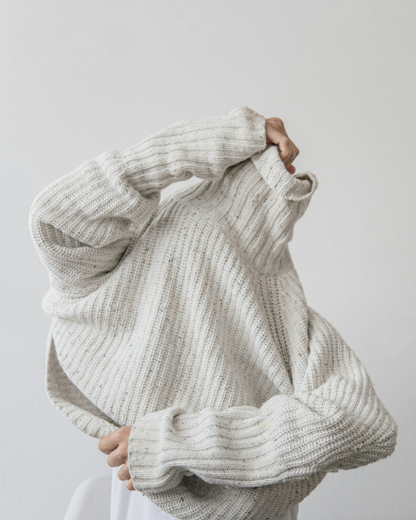 SKIMS neutral-tone ribbed knitwear basics representing the brand's foundational fashion aesthetic — now available in India via Reliance Brands