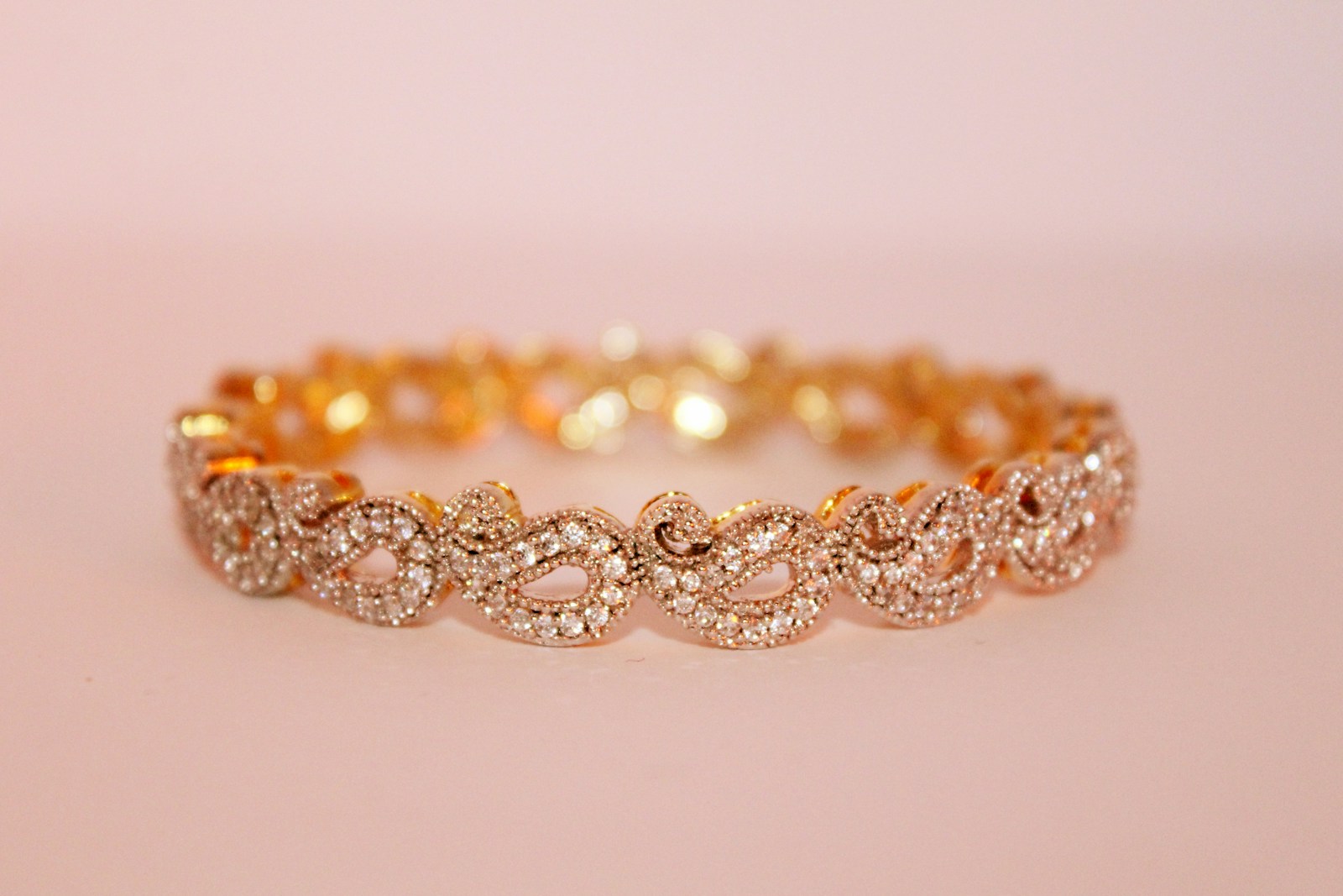 Diamond gemstone close-up with brilliant facets catching the light, editorial jewellery photography