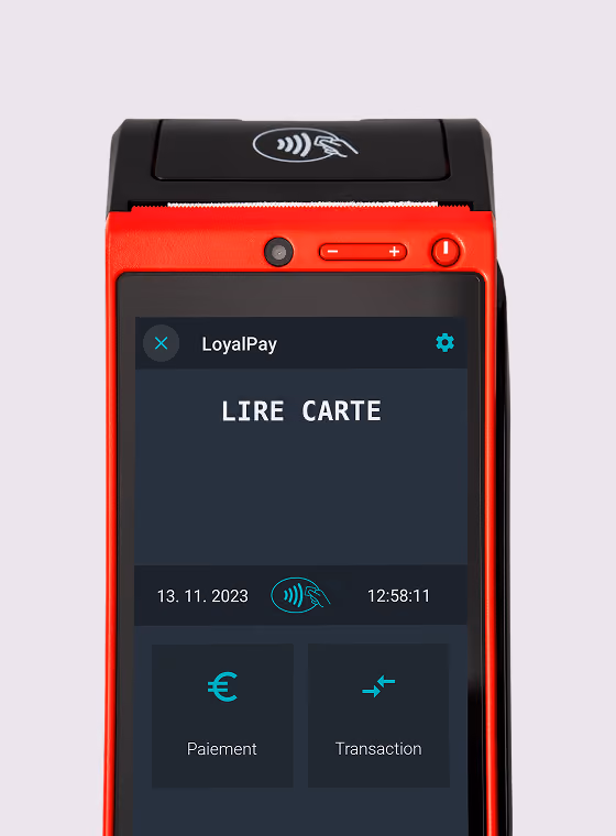 Payment terminal on a wooden surface showing $59.13 with insert, tap, or swipe options.
