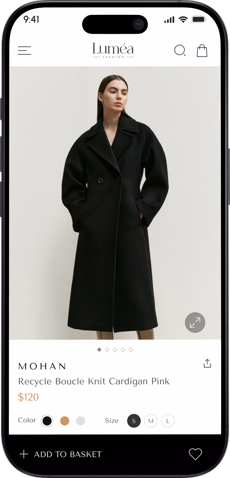 Woman wearing a long black coat with large lapels and pockets on a fashion shopping app.