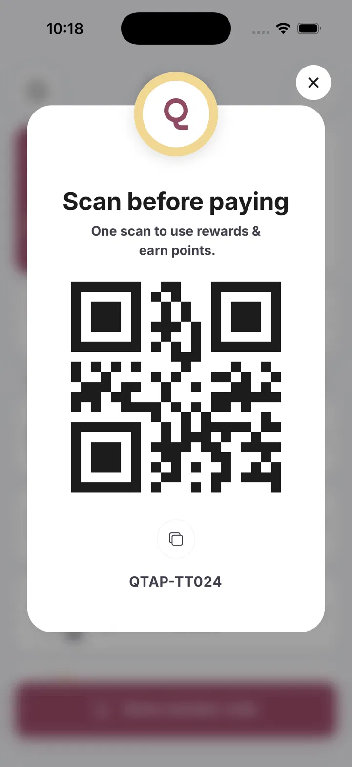 The Qtap app showing the member QR code