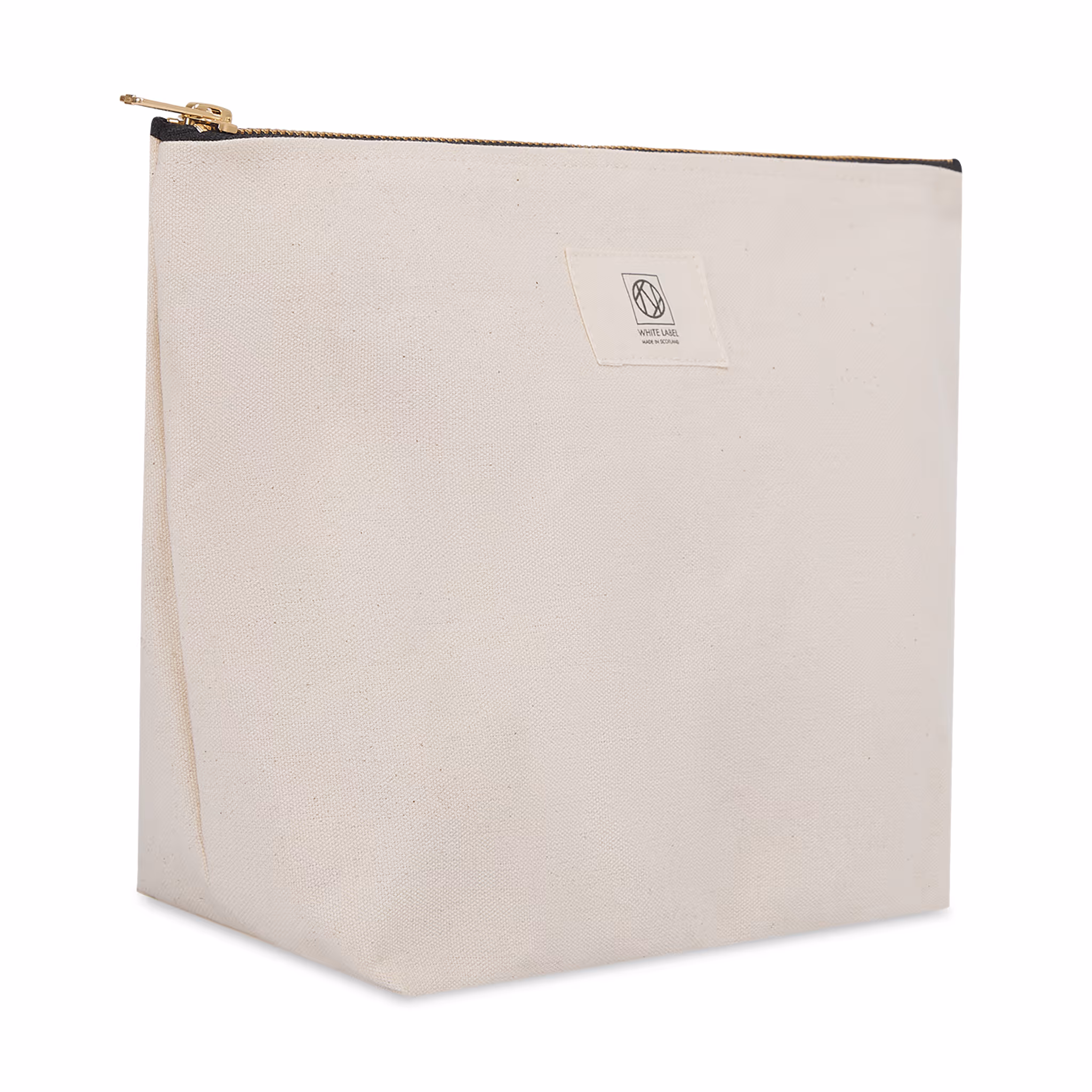 A medium sturdy canvas carryall bag in a neutral tone featuring a minimalist design and a secure zipper closure along the top.