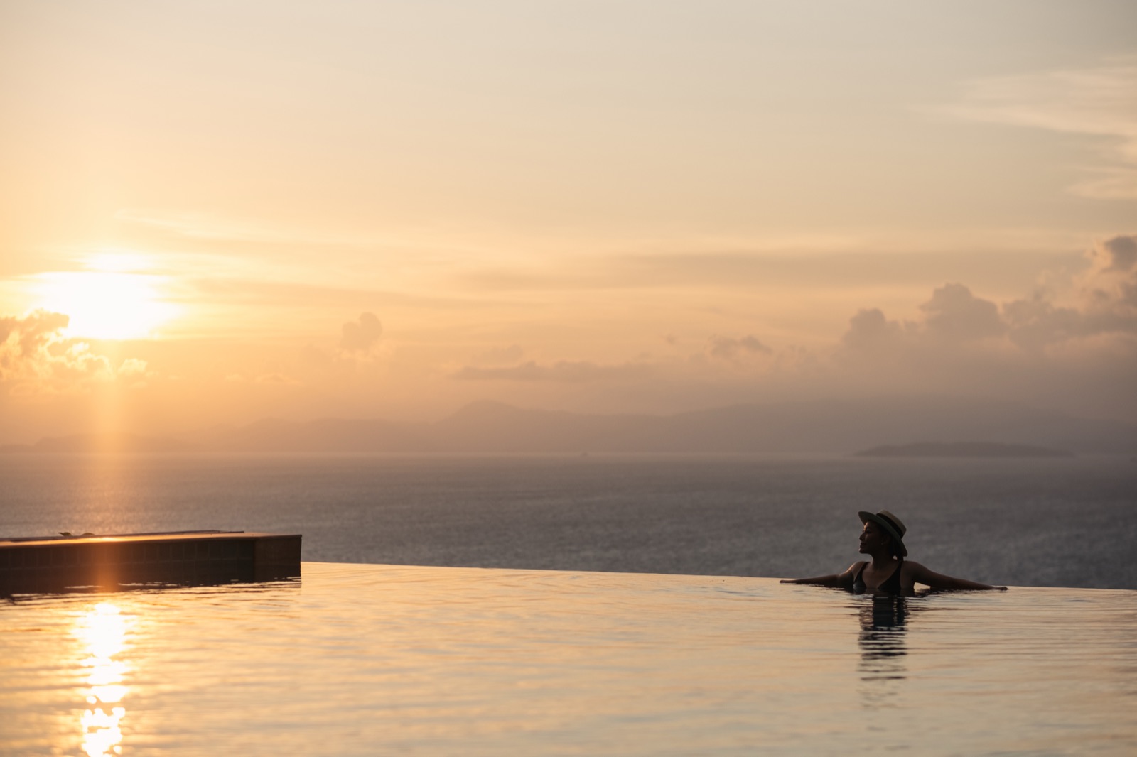An infinity pool facing the Mediterranean at sunset