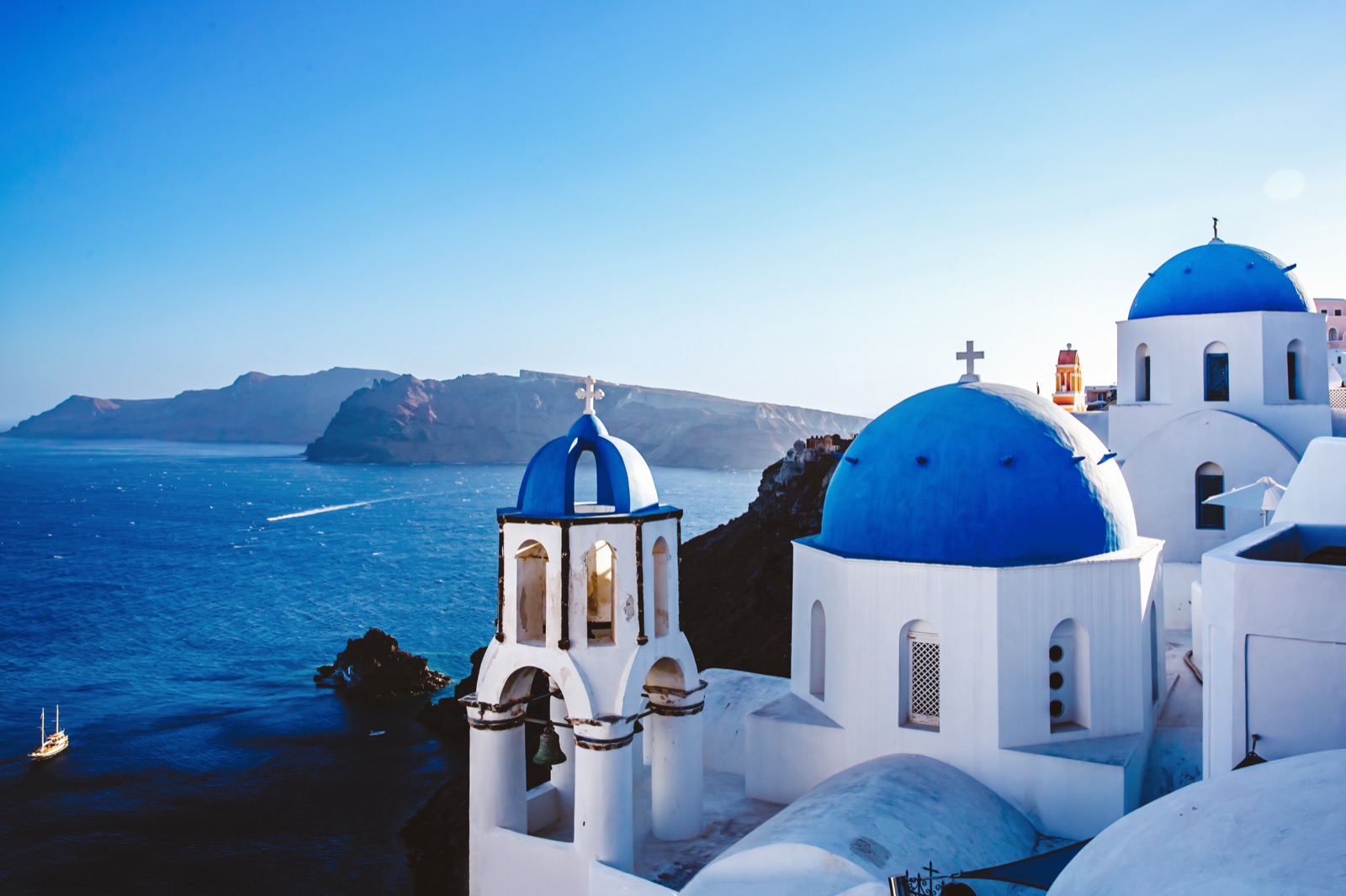 Blue-domed churches above the Aegean