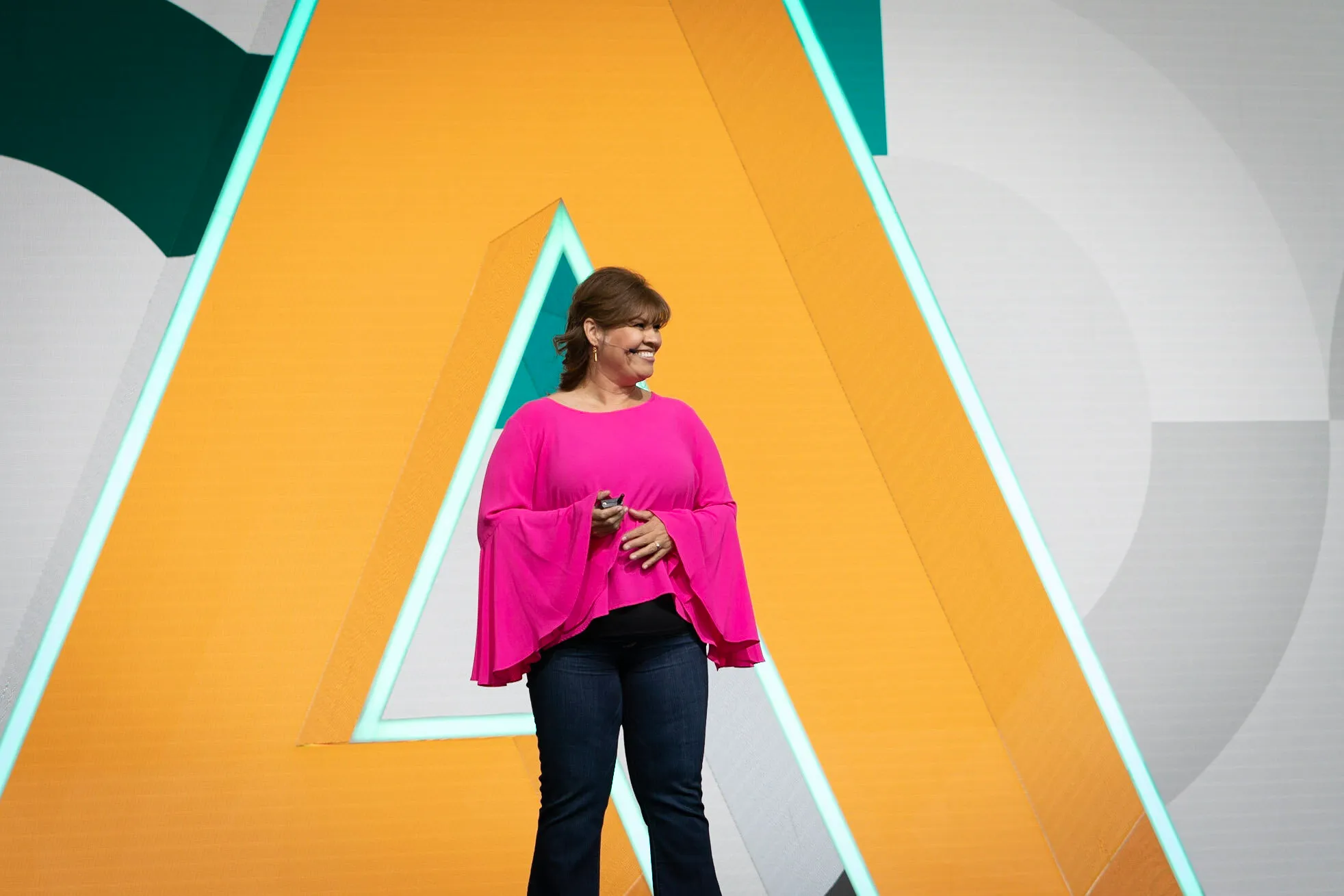 Martha Niño Rodriguez speaking on stage