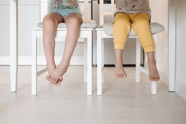 Should your feet hang off a recliner?