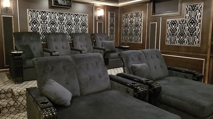 Beautiful custom theater seating makes this design pop