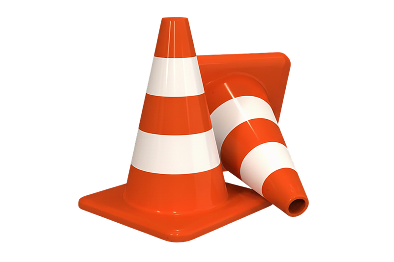 Two orange traffic cones with white reflective stripes, one standing upright and the other lying on its side.