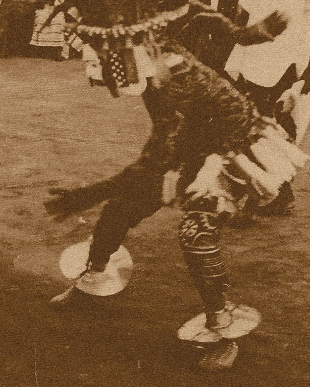 Igbo masquerade with brass adornments — cultural reference for Adala