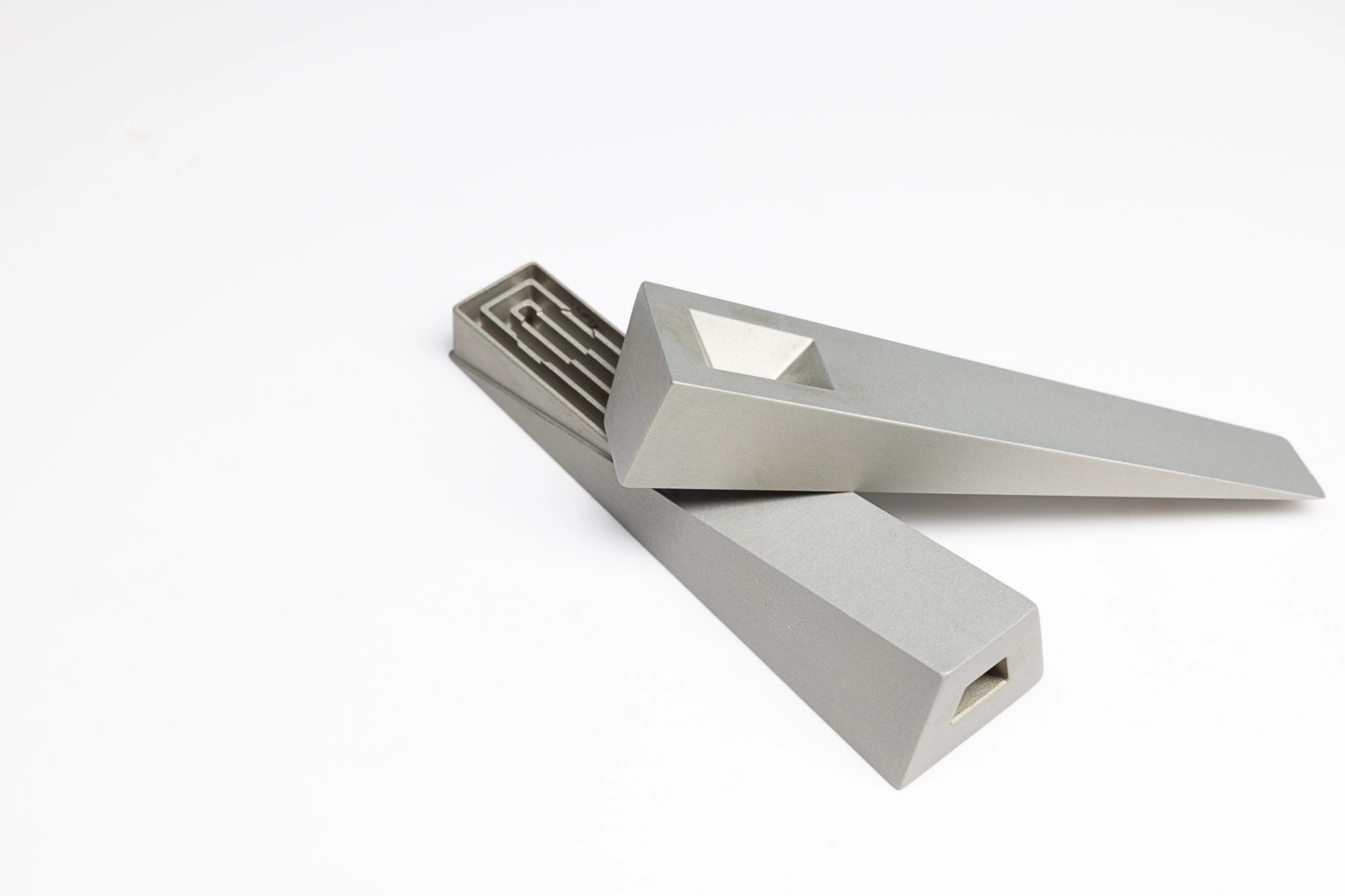 a silver Mercury Tempest smoking pipe shot in a studio with even lighting