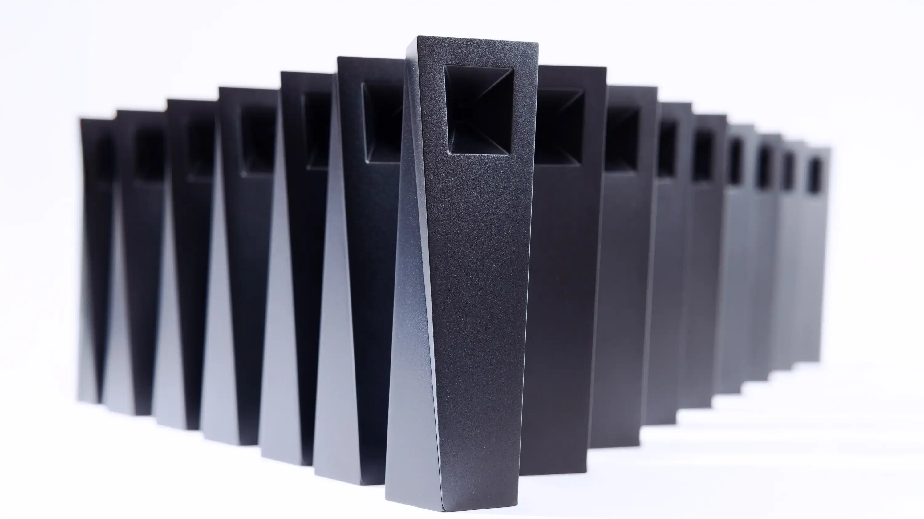 The Tempest pipe photographed on white in a triangular grouping