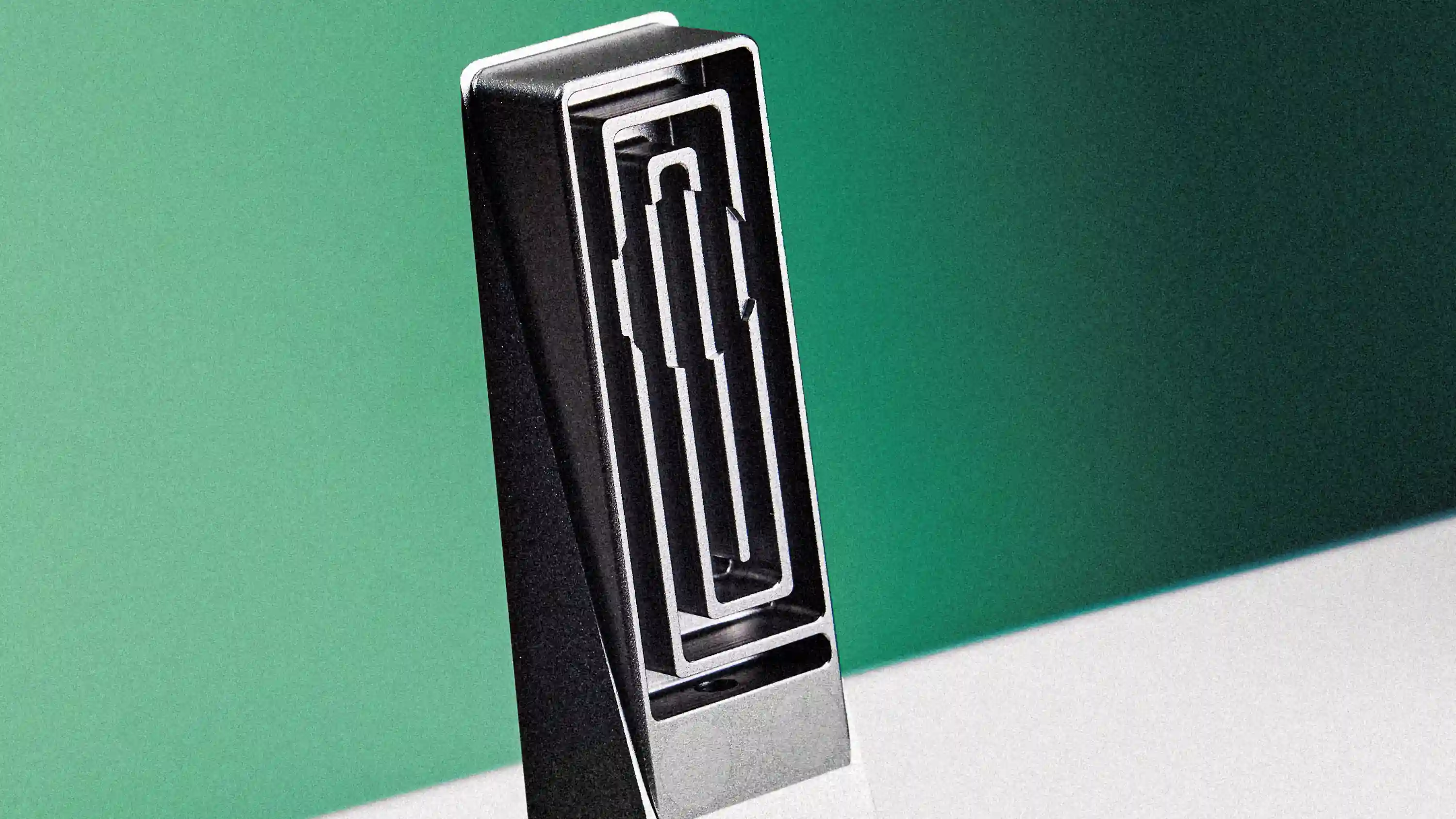 Magnetic pipe opened to show shaped airflow path with gentle turns and drop-out zones.