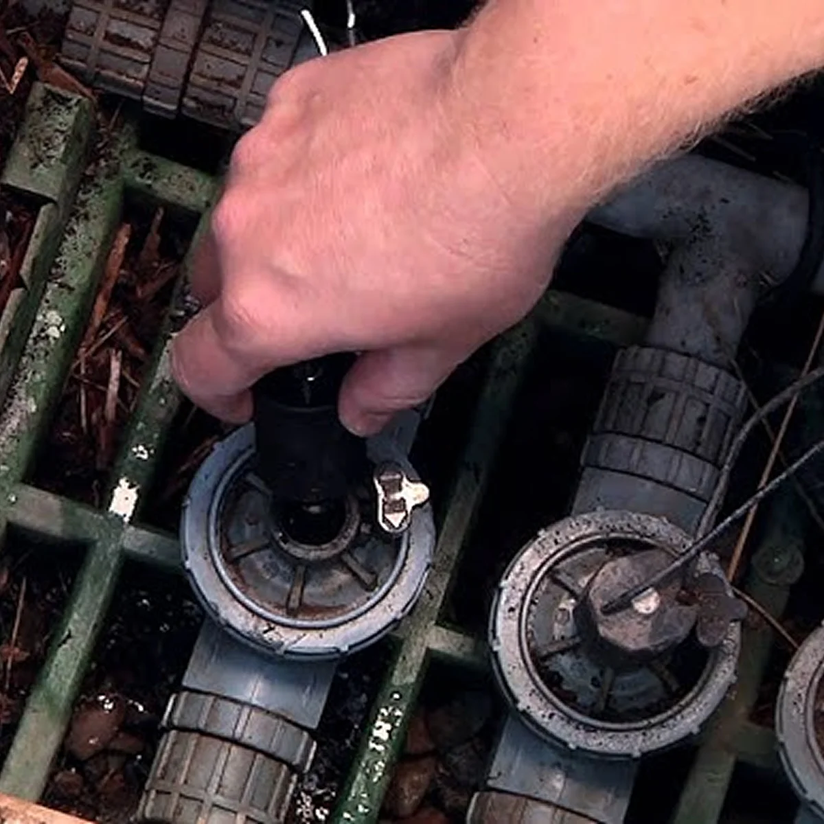 hand adjusting gray sprinkler valve box