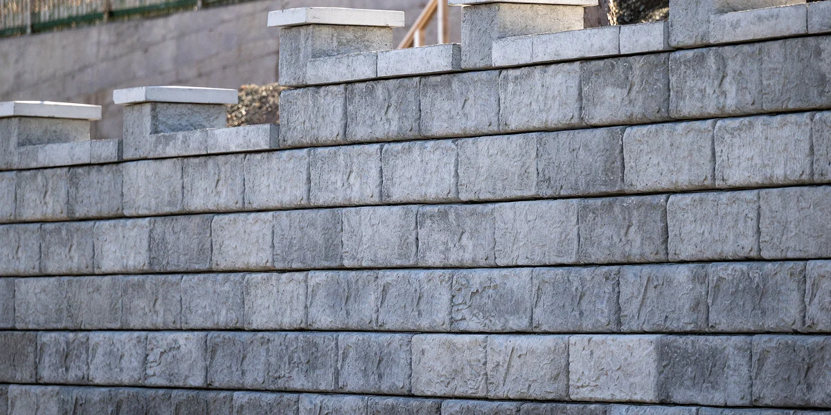 gray concrete block retaining wall closeup