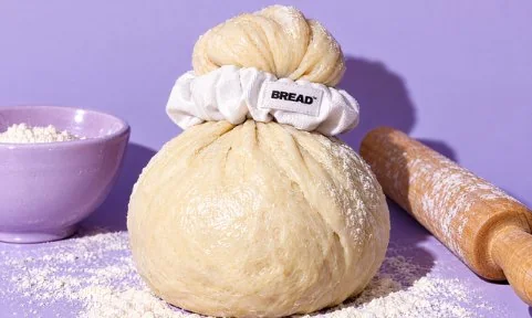 Proofing dough tied with a BREAD scrunchie
