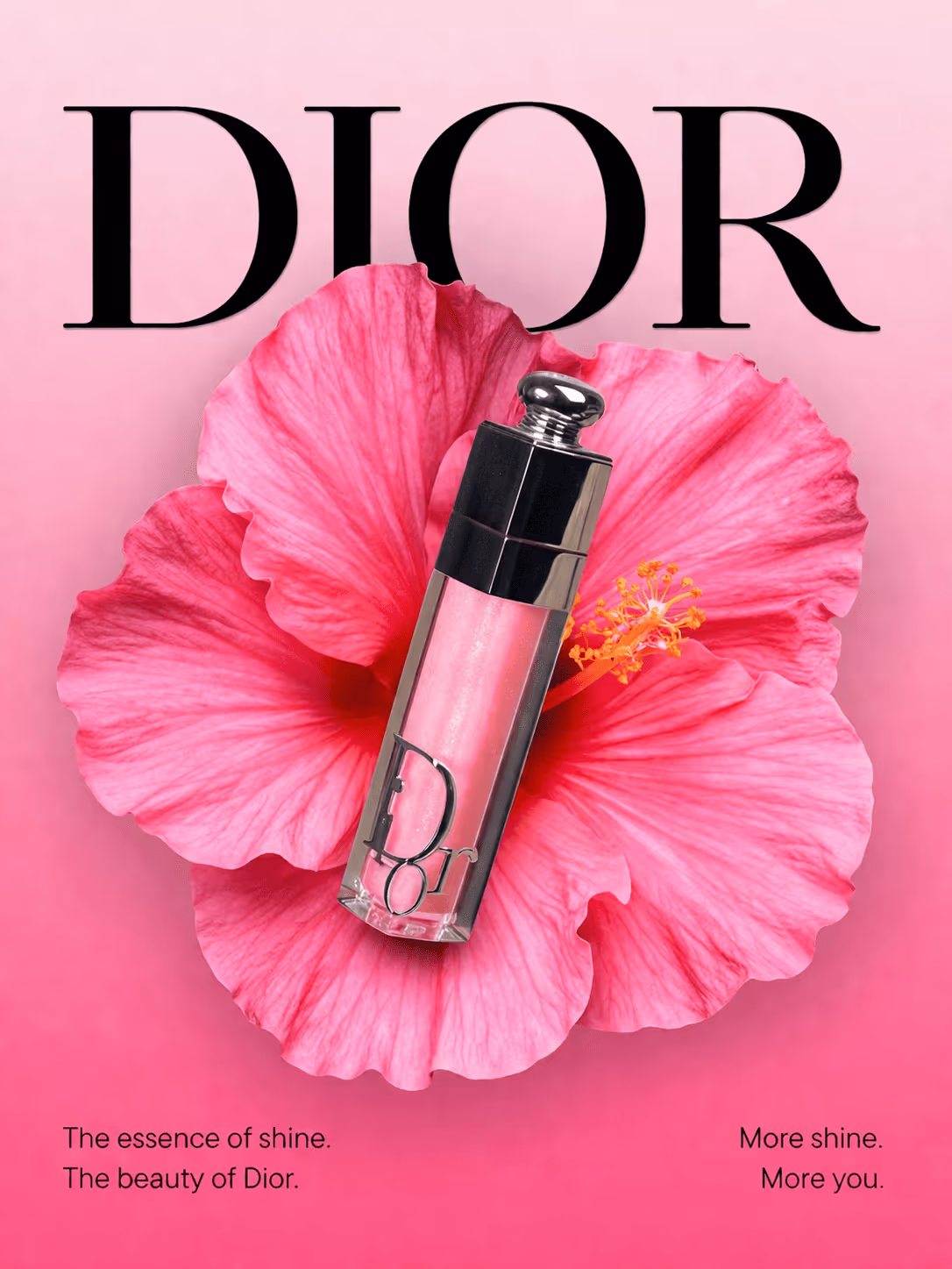 Dior lip gloss bottle placed on a large pink flower with a pink gradient background and the text 'The essence of shine. The beauty of Dior. More shine. More you.'