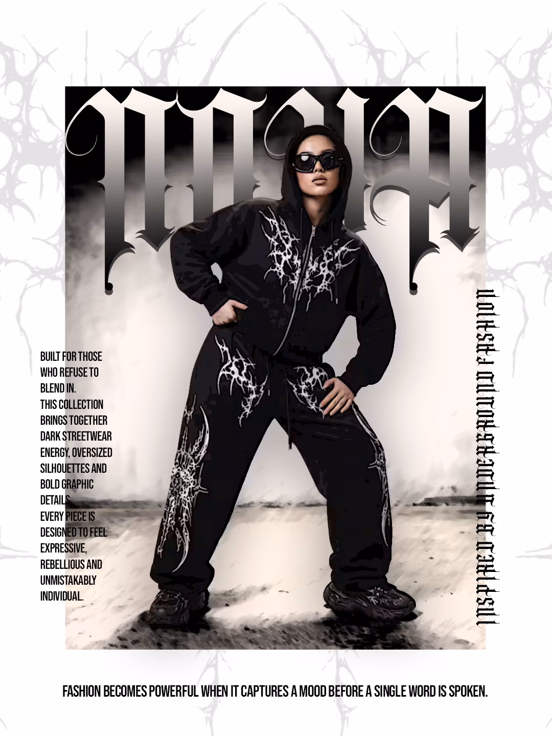 Person in black hooded streetwear with bold white graphic designs and oversized sunglasses.
