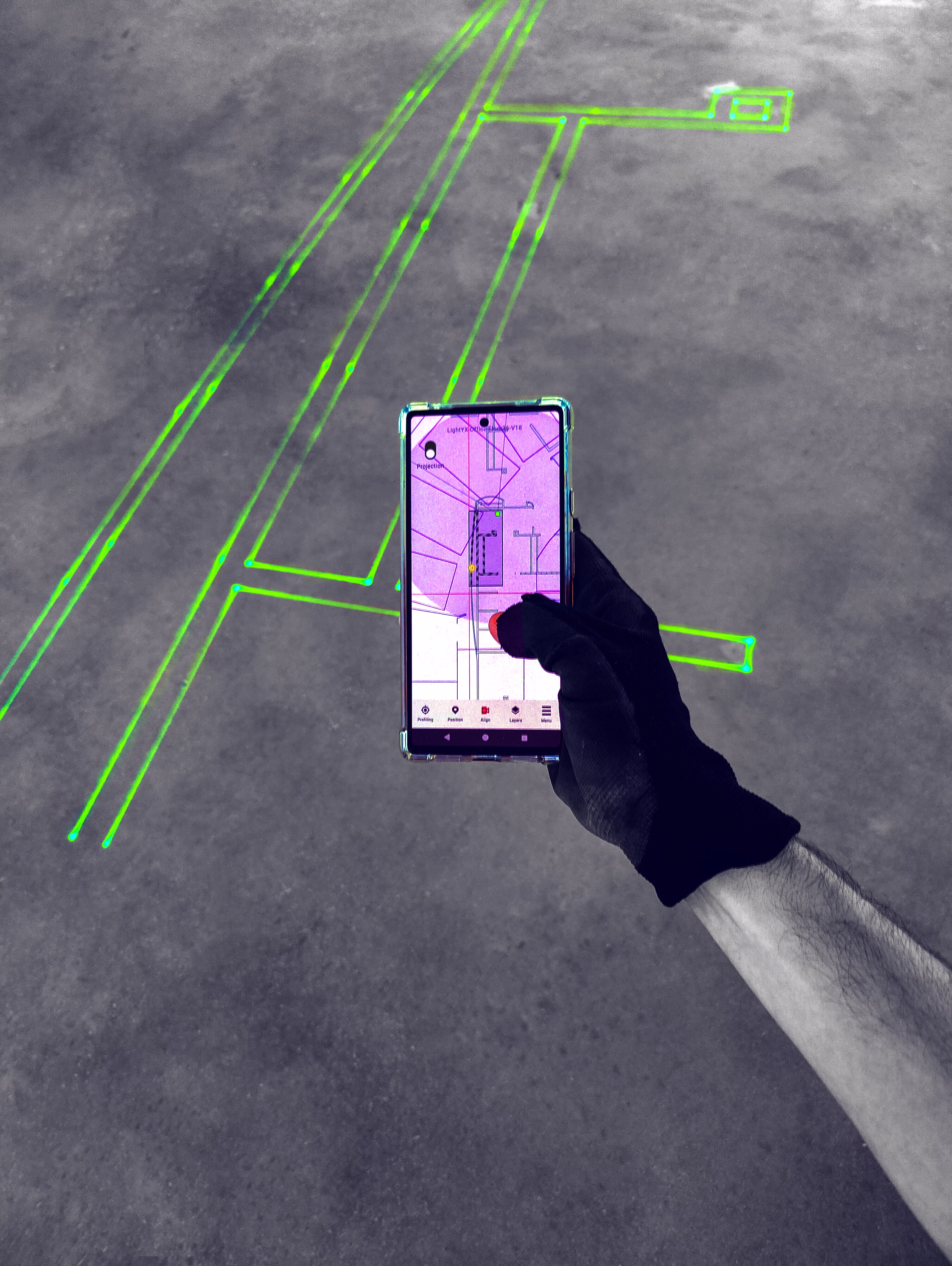 A photo of using LightYX app to control digital layout