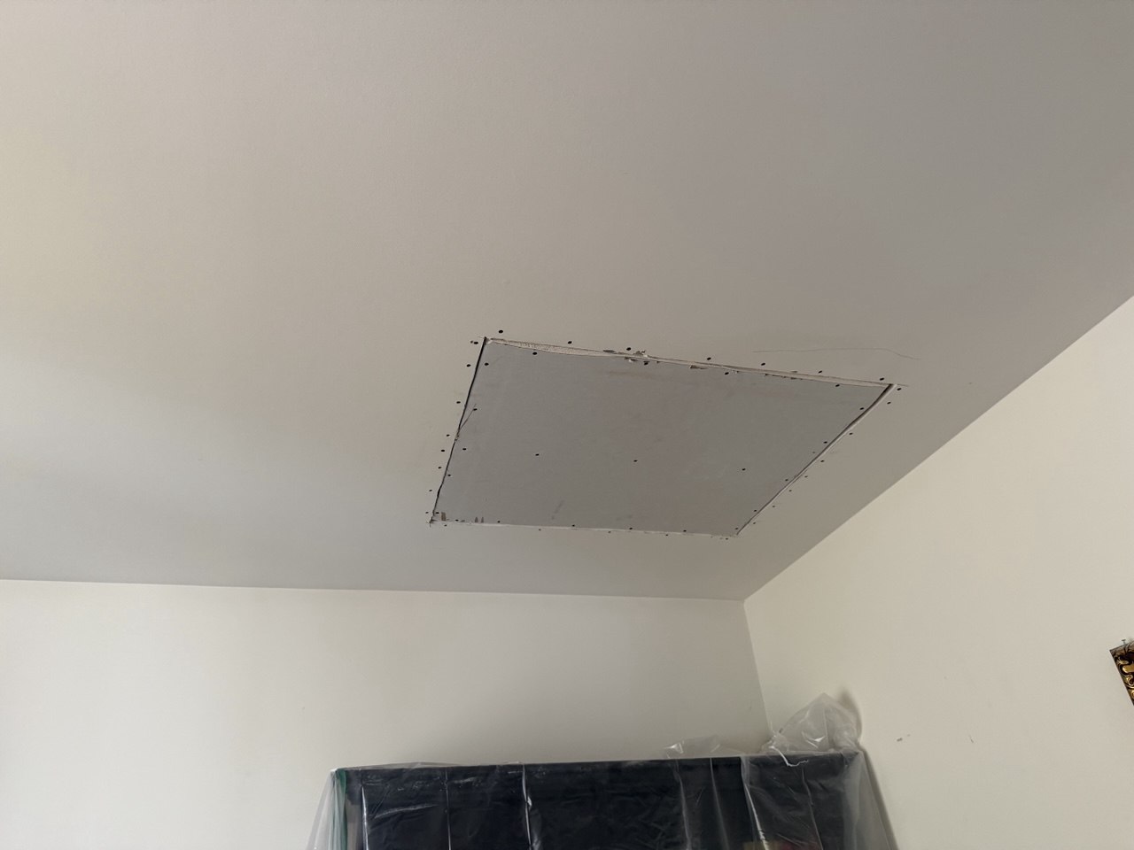 Ceiling drywall damage after water leak before repair in Naperville IL