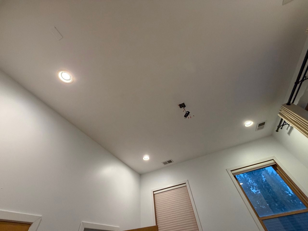 Repaired and painted ceiling and walls in Wheaton, with the ceiling fan removed