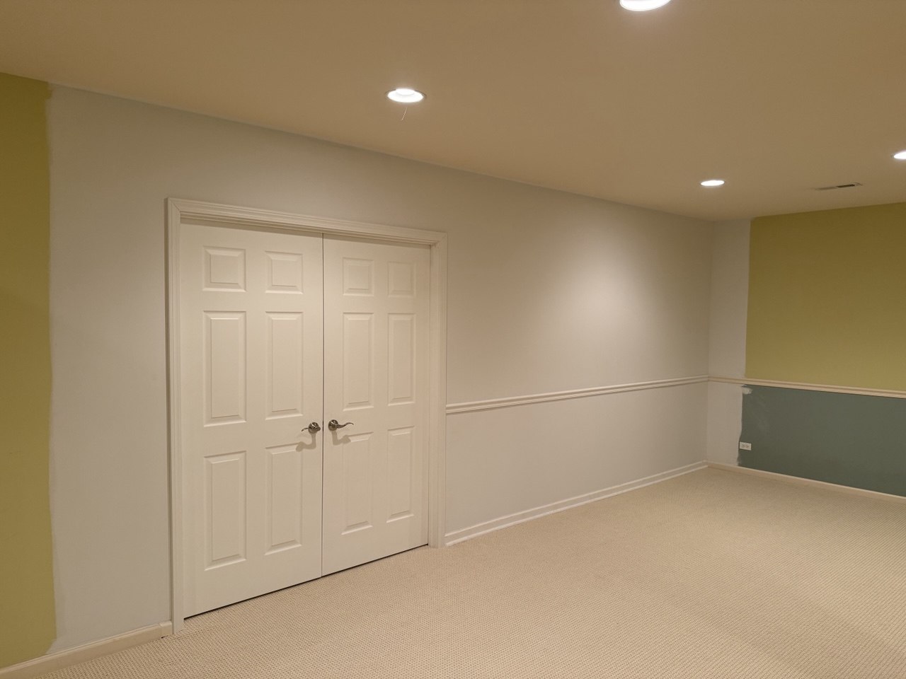 Completed new partition wall with double doors and trim in Darien, IL