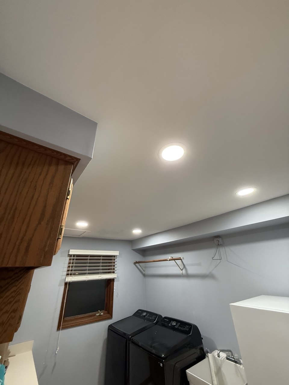 Finished laundry room ceiling with recessed lights in Naperville, IL