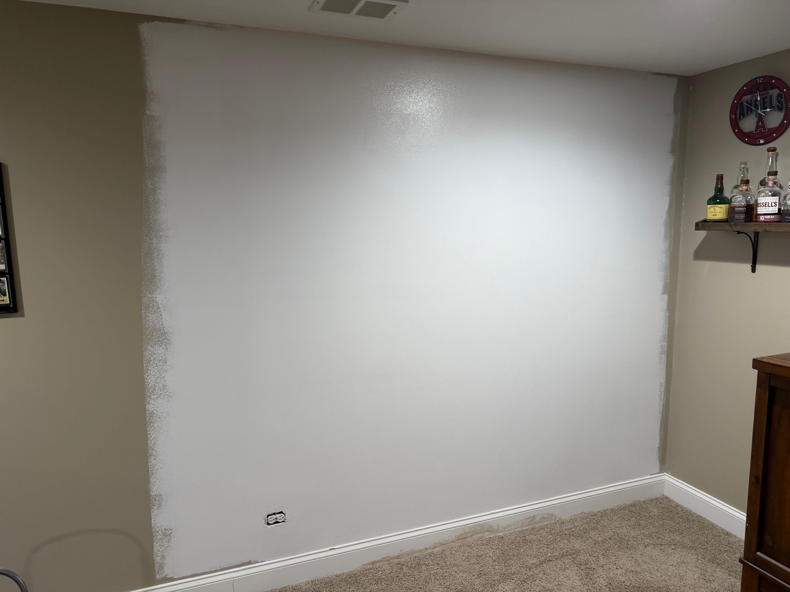 Smooth wall after drywall installation, taping, sanding, and primer in Lemont, IL, before finish paint