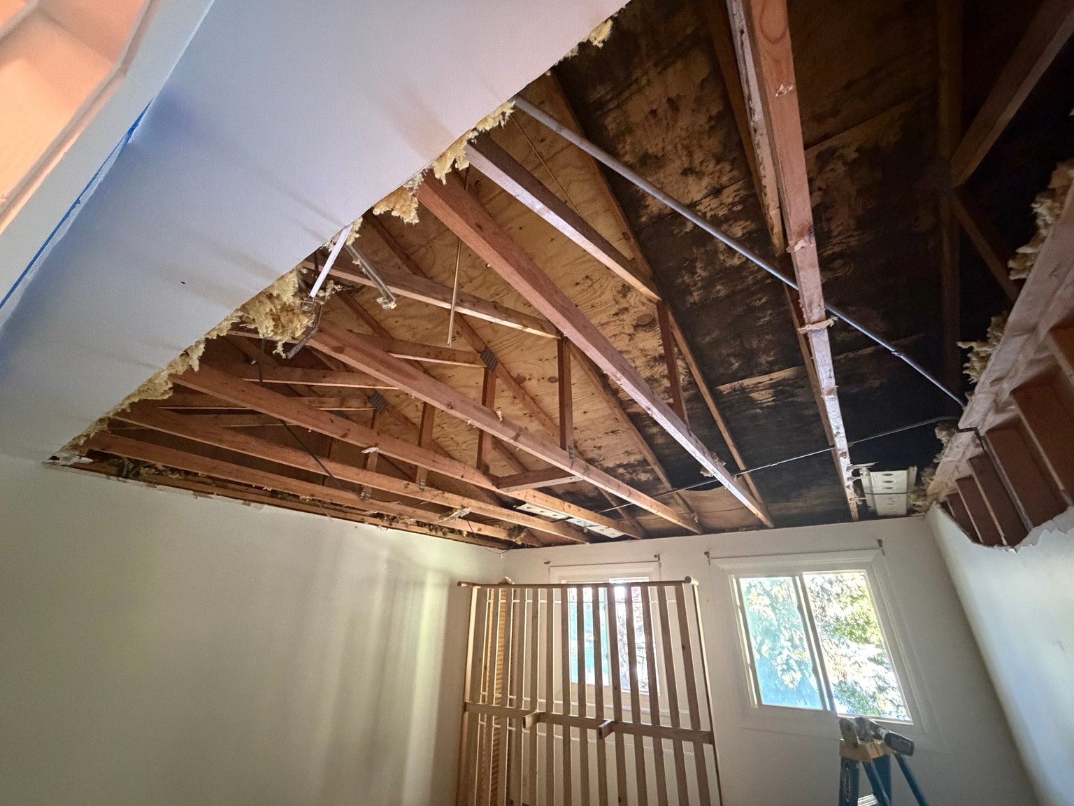 Open ceiling framing before EasyPatch repaired a collapsed ceiling in Wheaton, IL
