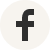 Facebook logo inside a gray circle.