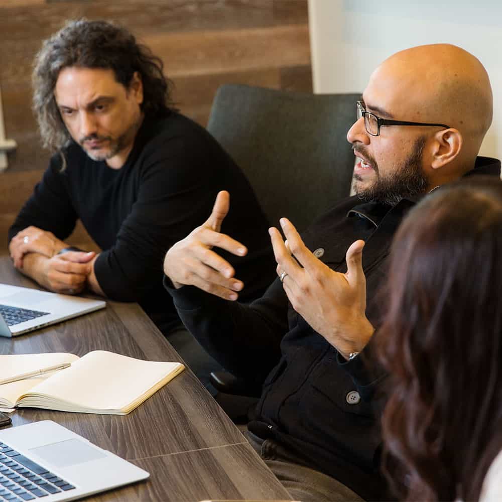 MESH agency team members discussing strategy
