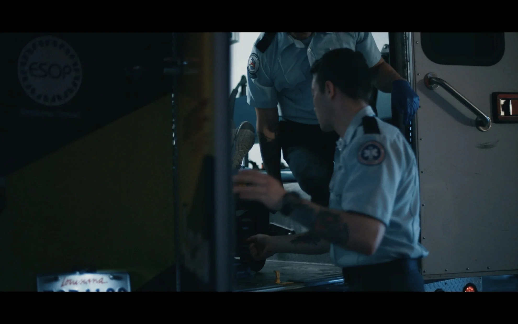 Thumbnail of the beginning of a video with EMS staff removing someone from an ambulance