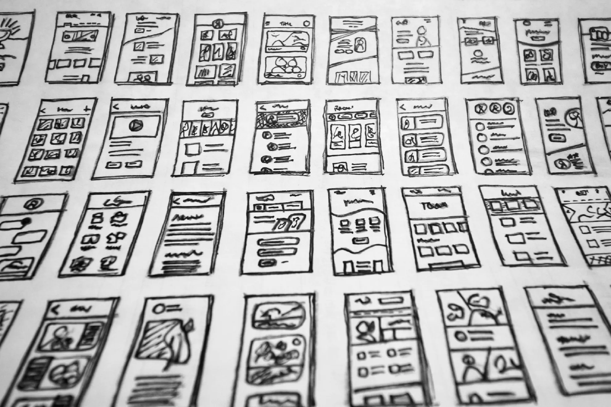 website sketches laid out on flat surface